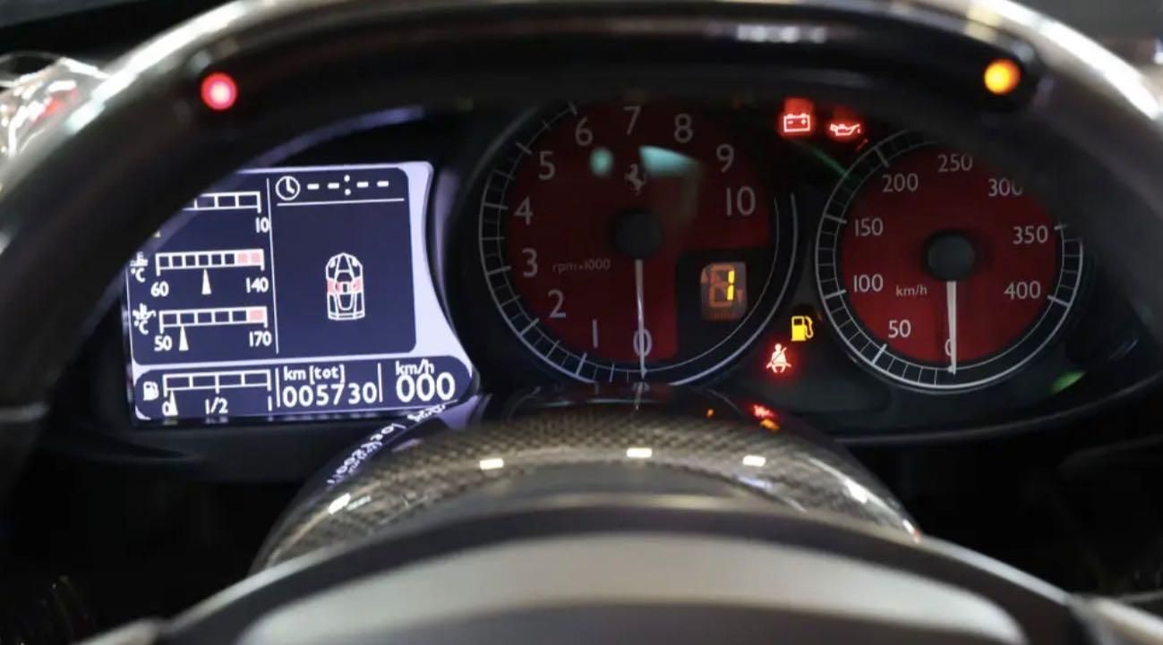 Ferrari Enzo nera opaca RM Sotheby's auction Brunei strumentazione