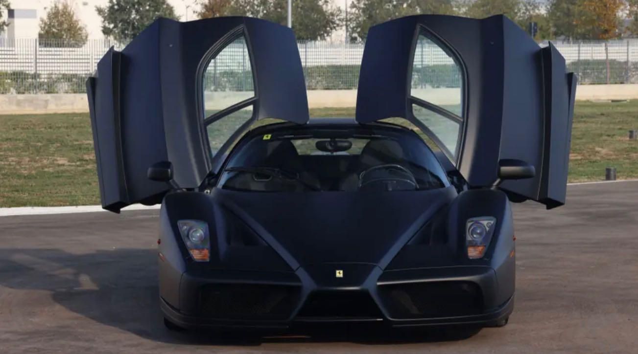 Ferrari Enzo nera opaca RM Sotheby's auction Brunei porte aperte